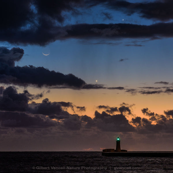 Moon, Jupiter and Venus over Valletta Lighthouse